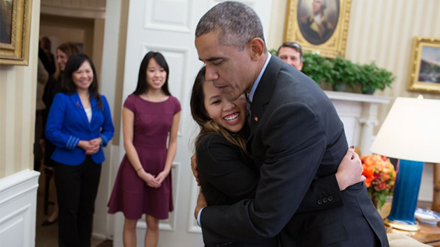 Obama Uses Hugs, Kisses to Ease Ebola Fears
